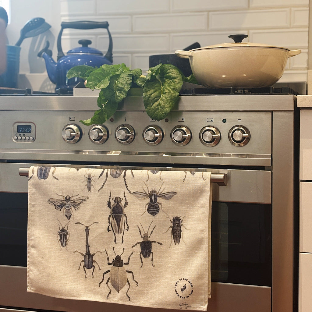 Ink bugs linen tea towel