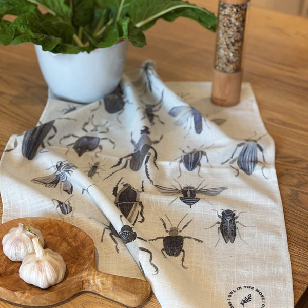 Ink bugs linen tea towel