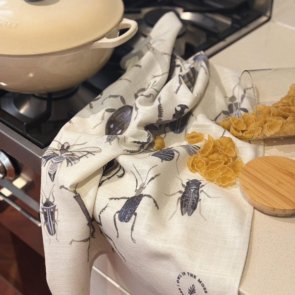 Ink bugs linen tea towel